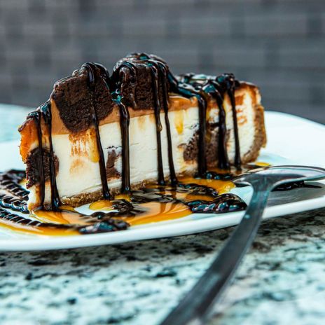 a delicious brownie chocolate caramel cheesecake at Swift Grill