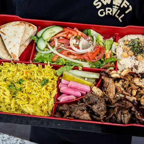 Duo platter with Chicken Shawarma, Beef & Lamb, erved with rice, PITA, garlic sauce, salad, hummus, pickles & Turnips